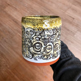Black and Yellow Funky Faces Sleeve Mug with Black and Yellow Lip Drip
