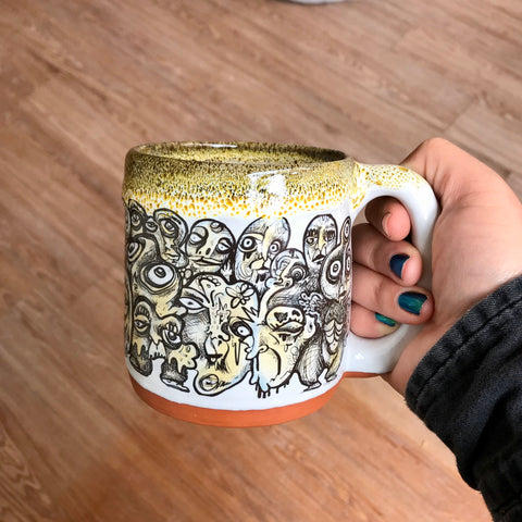 Black and Yellow Funky Faces Sleeve Mug with Black and Yellow Lip Drip